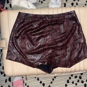 Maroon and black snake print leather skort size small